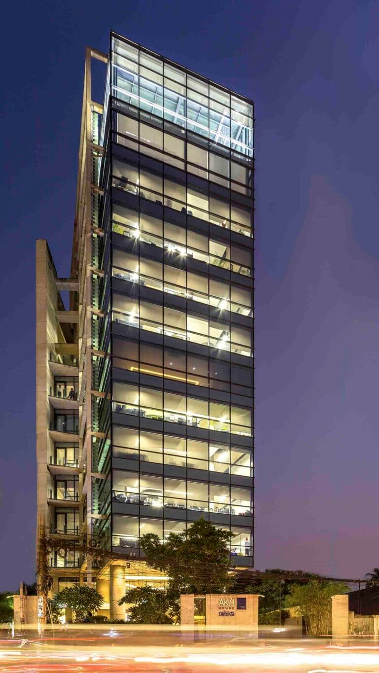 AKIJ Resource headquarters tower at dusk